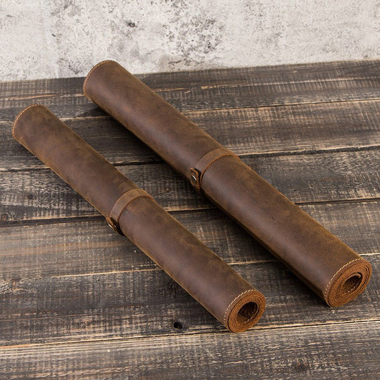 Leather oversized non-slip mouse/pad work station rolls, perfect for a stylish and functional workspace.