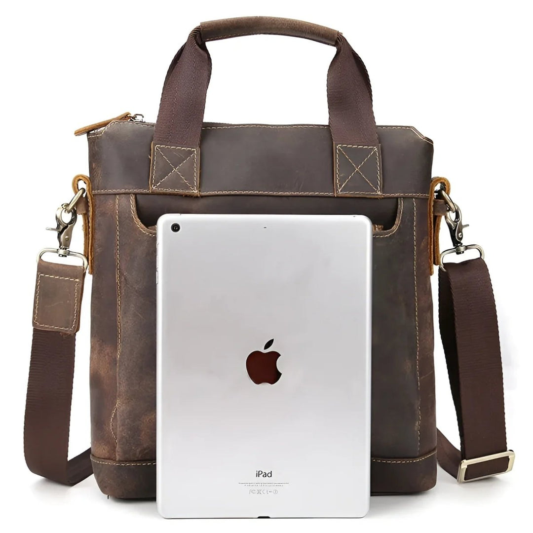 Stylish full leather messenger bag/satchel featuring sturdy handles and a detachable strap, perfect for daily use.
