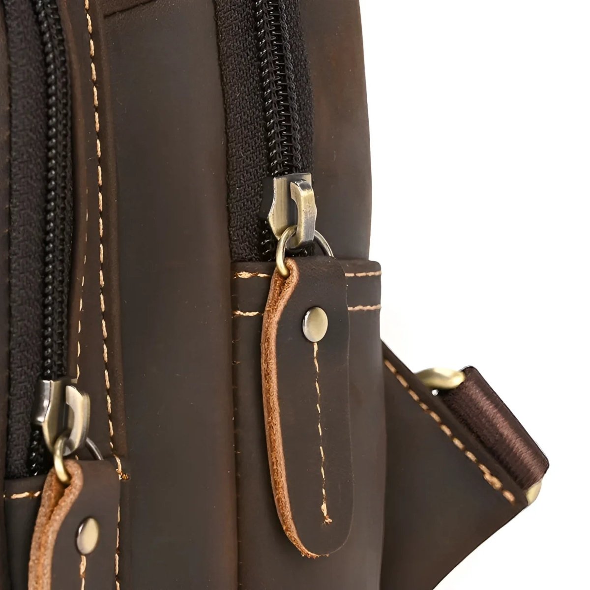Stylish vintage leather crossbody/sling bag featuring durable zippers and quality craftsmanship. Perfect for any occasion.