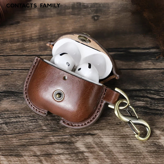 Stylish Airpods 4 leather case from Contacts Family, featuring a secure clasp and elegant design for protection.