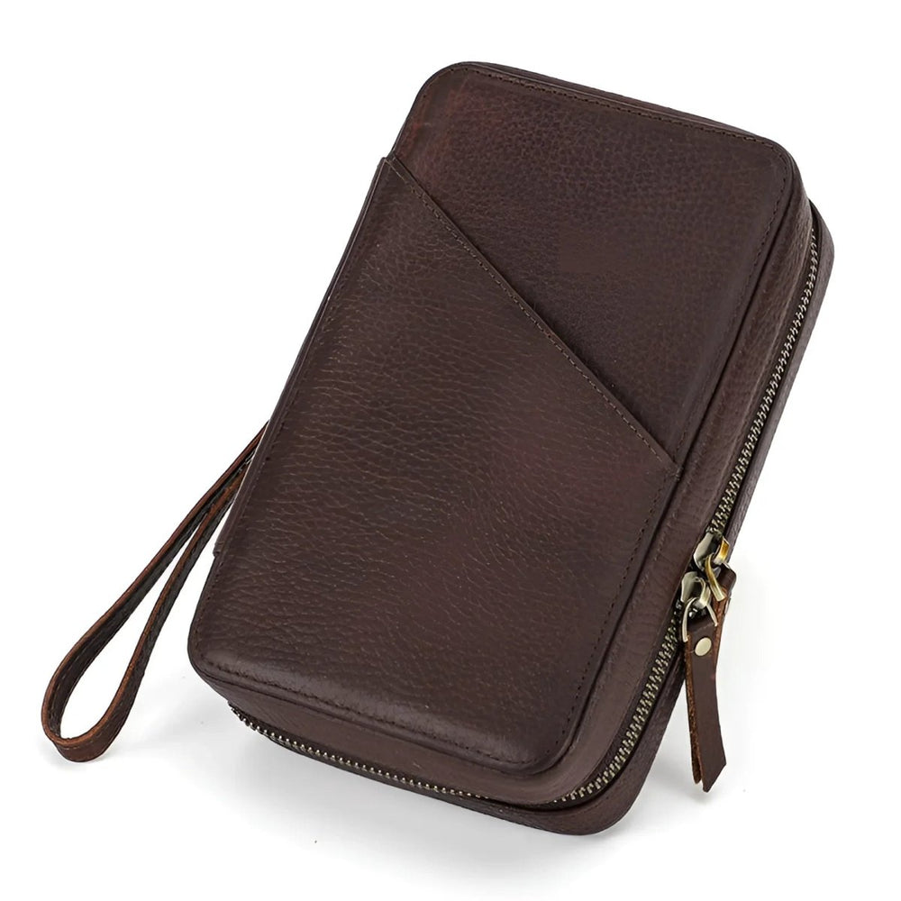 Stylish travel cable organizer in brown leather, perfect for keeping your cords tidy while traveling.