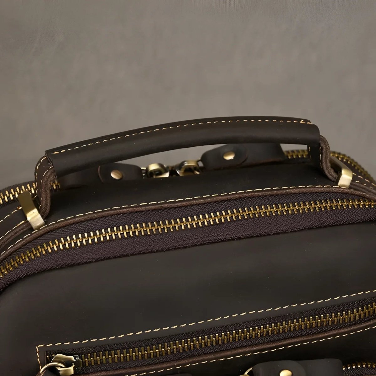 Stylish and functional, The tablet satchel features elegant zippers and a comfortable handle for easy carrying.