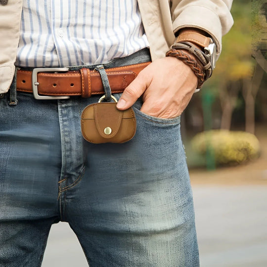 Stylish airpod case attached to a belt loop, perfect for on-the-go convenience and protection.