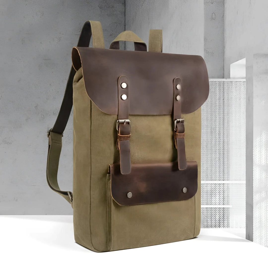 Stylish vintage leather/canvas backpack showcasing a blend of durability and classic design for any adventure.