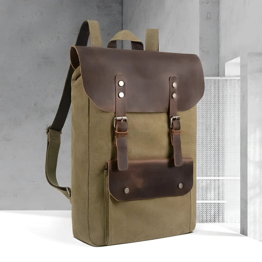 Stylish vintage leather/canvas backpack showcasing a blend of durability and classic design for any adventure.