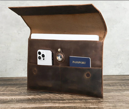 Stylish Leather sleeve macbook pro 13.3" with pockets for essentials, perfect for on-the-go professionals.
