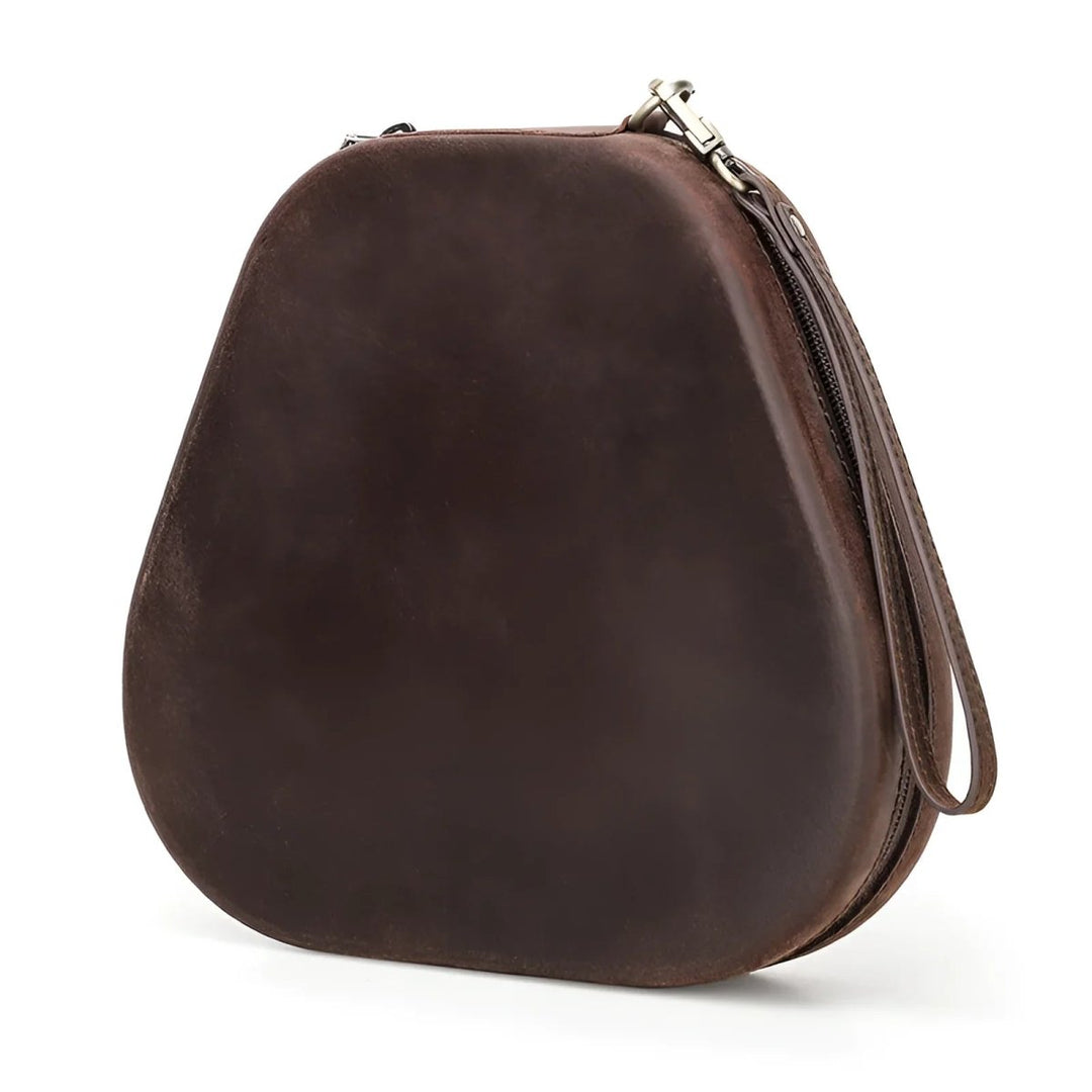 Stylish Apple airpods max leather case in dark brown, perfect for protecting your headphones on the go.
