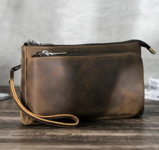 Stylish Full grain leather tech travel bag with multiple compartments for organized storage, perfect for on-the-go.
