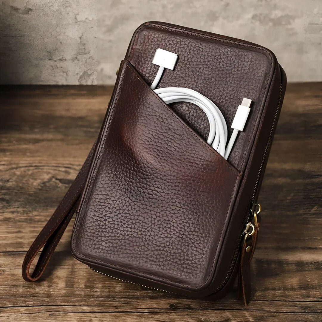Stylish travel cable organizer with a pocket for easy access to your charging cables and accessories.