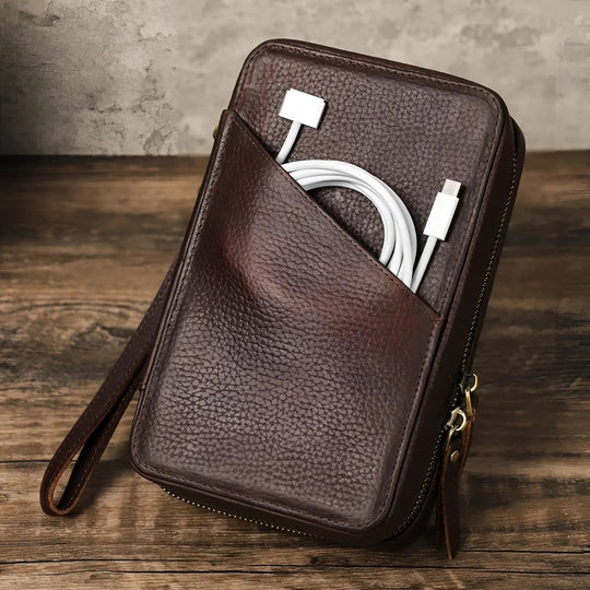 Stylish travel cable organizer with a pocket for easy access to your charging cables and accessories.