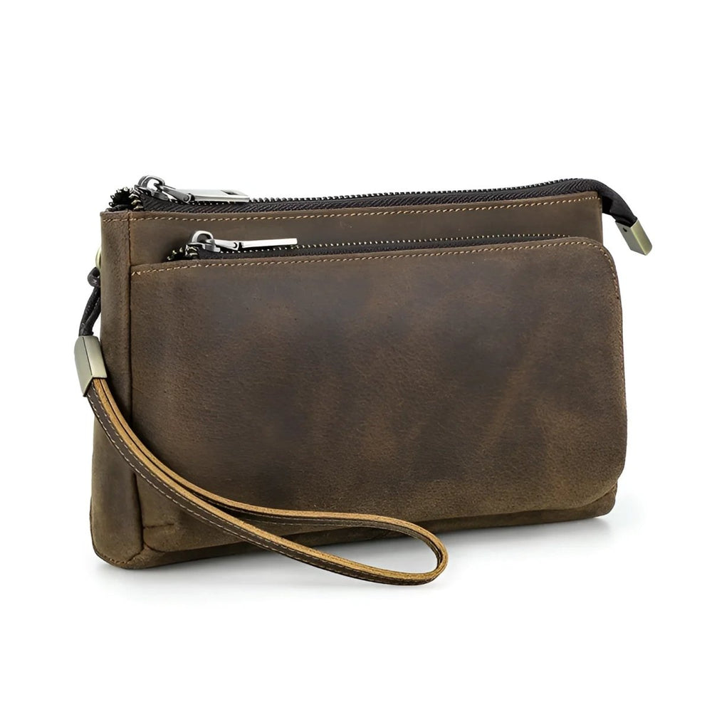 Stylish full grain leather tech travel bag featuring multiple zippered pockets for convenience and organization.