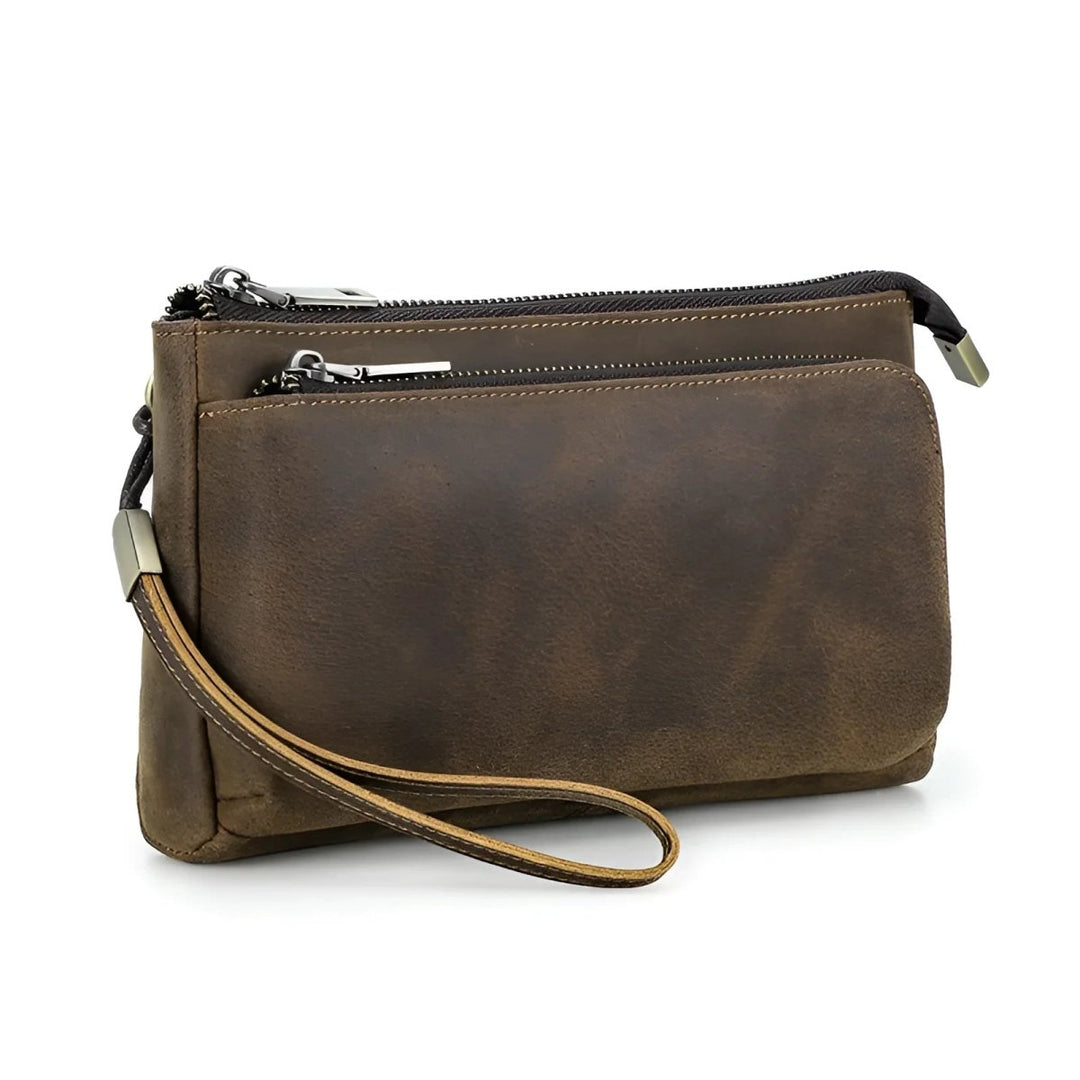 Stylish full grain leather tech travel bag featuring multiple zippered pockets for convenience and organization.