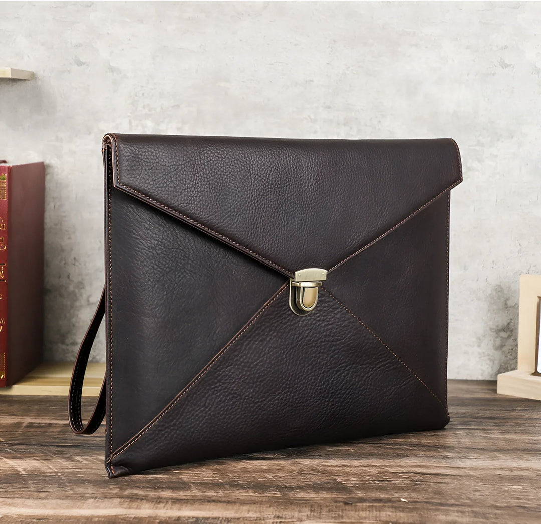 Stylish Leather Laptop Sleeve macbook 13/14 inch with elegant design and secure clasp, perfect for professionals.