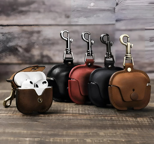 Stylish Airpods 3 leather case in brown, black, and red, perfect for protecting your earbuds by Contacts Family.
