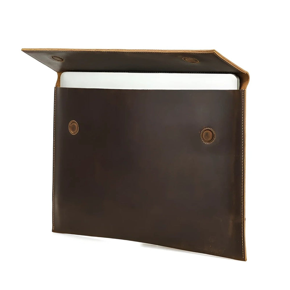 Stylish Sleeve MacBook Air 15 in dark leather, offering sleek protection for your device. Ideal for modern professionals.
