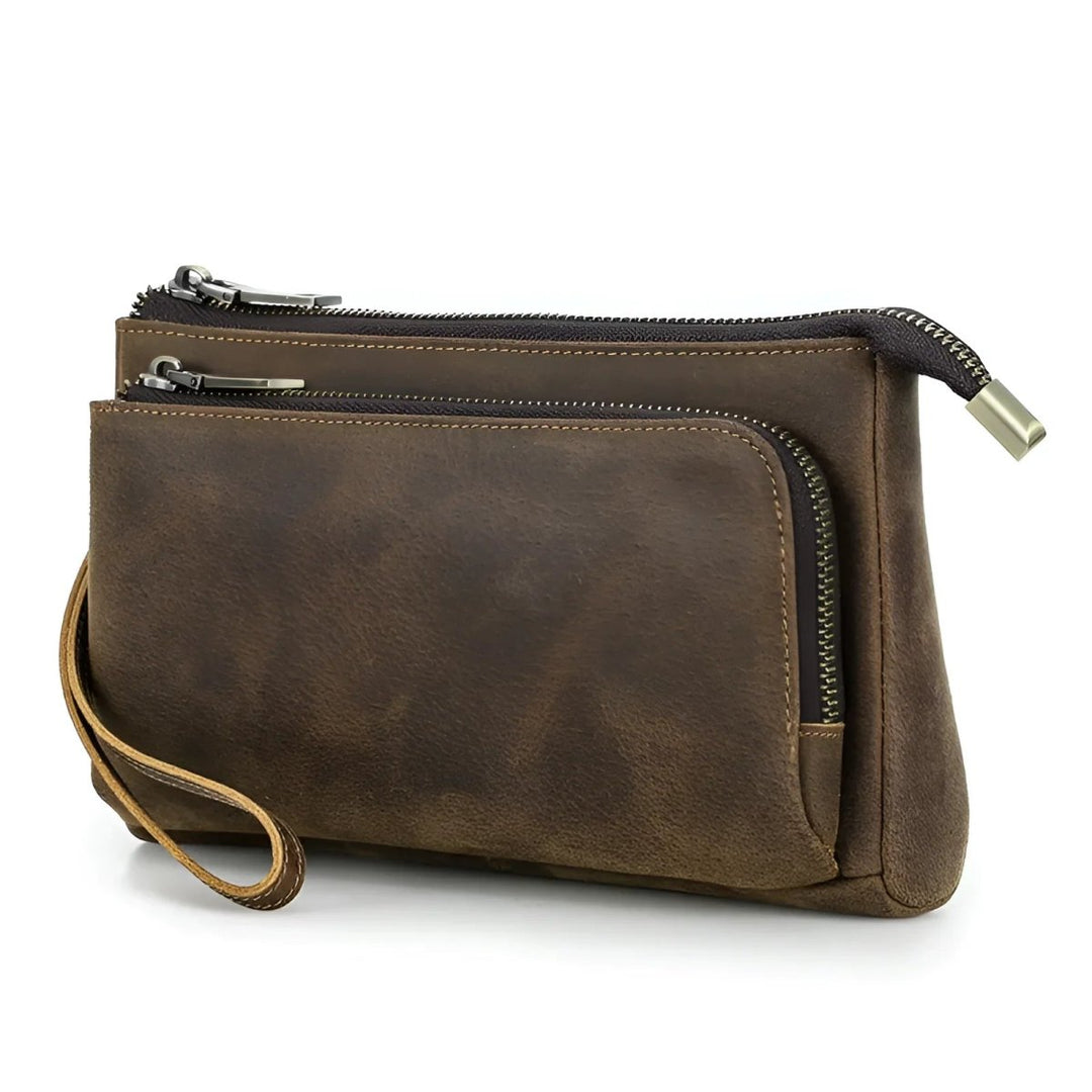Stylish full grain leather tech travel bag with multiple zip pockets for organized travel essentials.